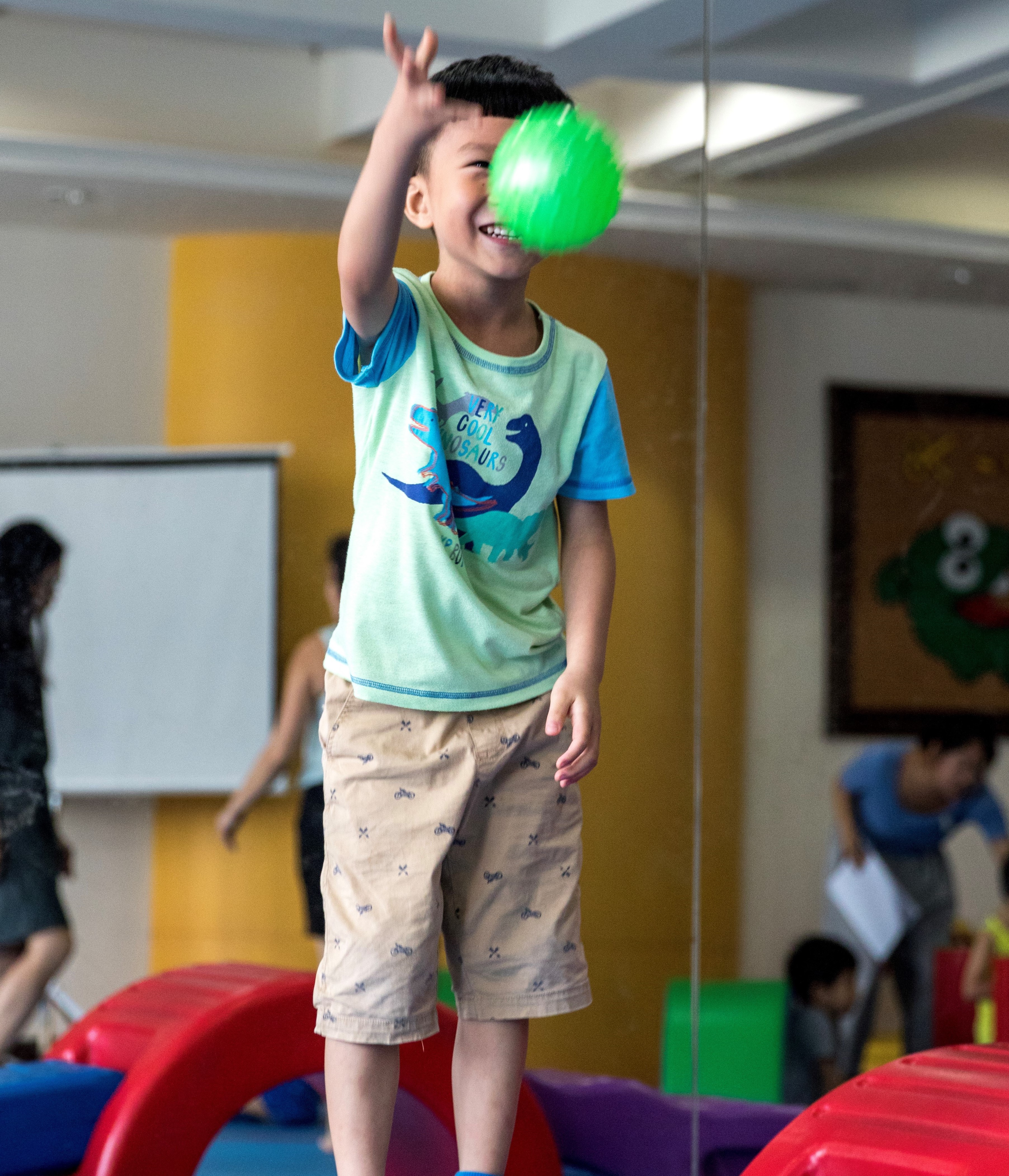 Child throwing ball